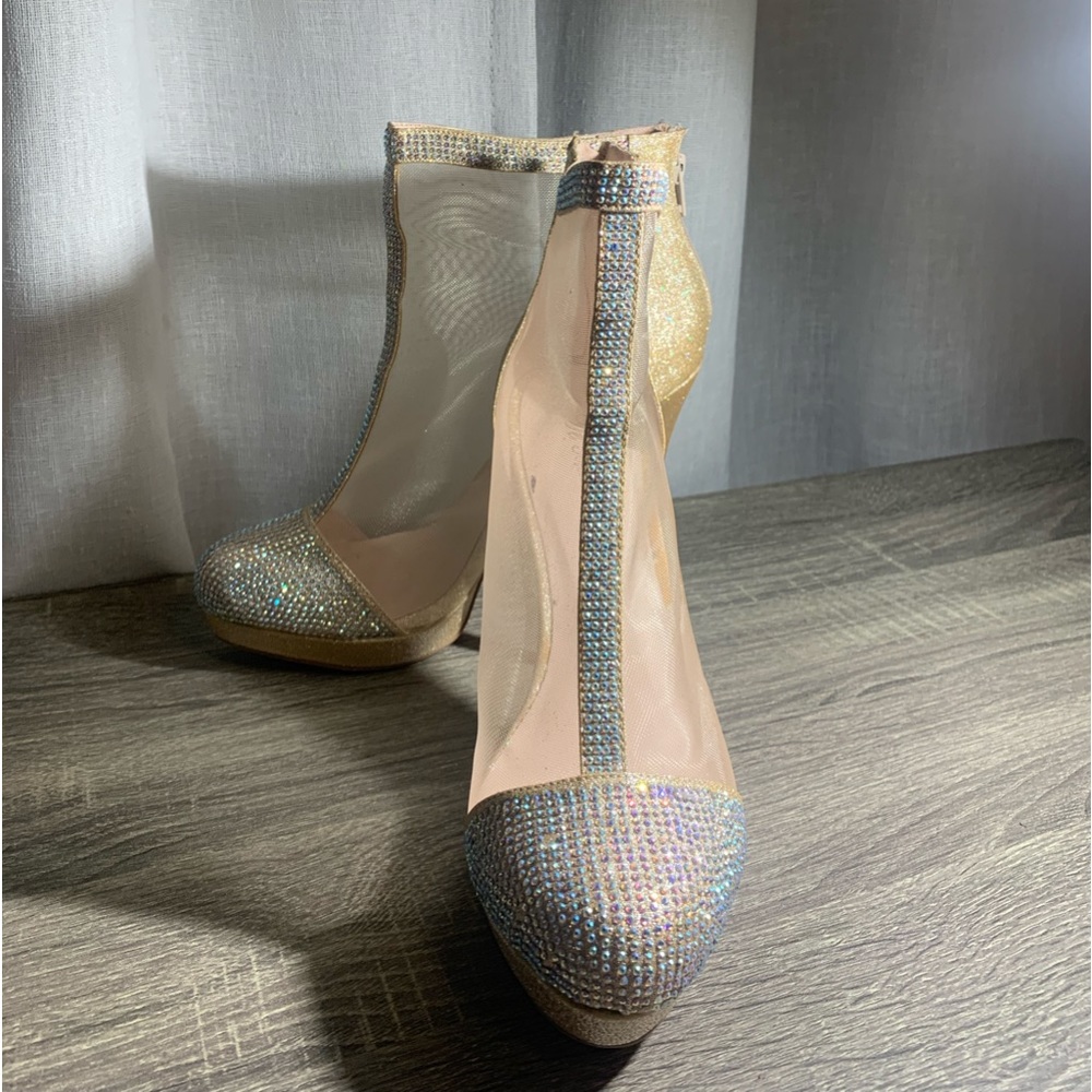 Gold/ rhinestones high heels very sexy on.